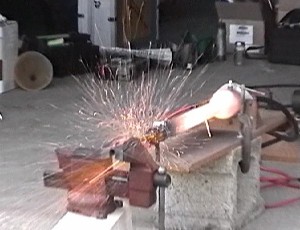 Partial destruction of mild steel sample tube in DynaJet tailpipe - photo (c) 2003 Cottrill Cyclodyne Corp.